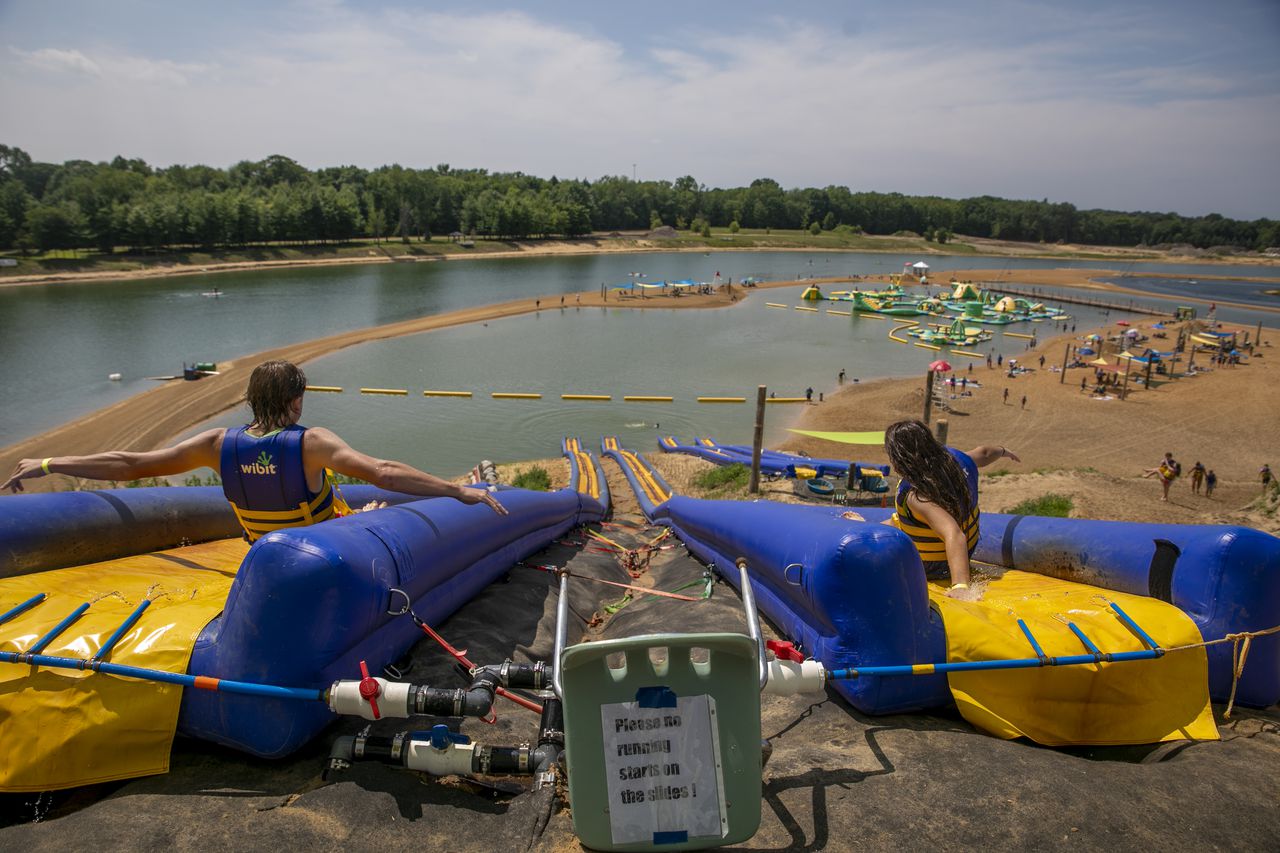 Divers find 142 pairs of glasses under waterslide in ‘zero-visibility’ lake drill